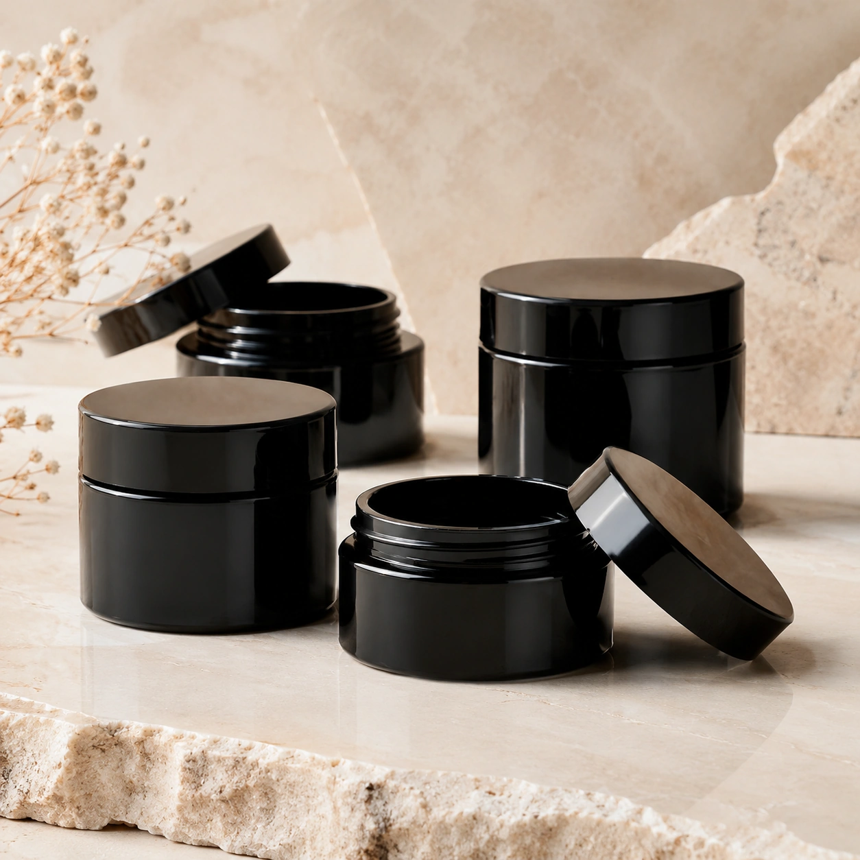 Glossy black cosmetic jars and closures